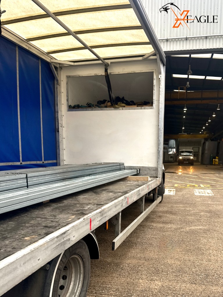 Curtain sider loaded with steel